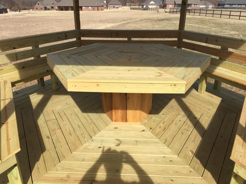 Octagonal gazebo with built-in furniture